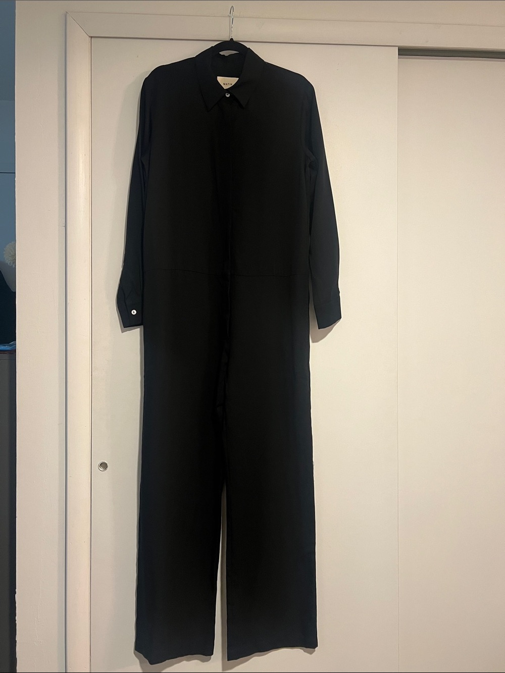 Black Long-Sleeve Women's Jumpsuit with Minimal Collar